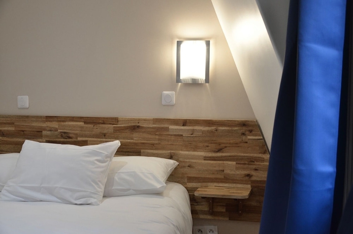 Imagen de la habitación del Hotel Hôtel De La Perdrix Rouge. Foto 8