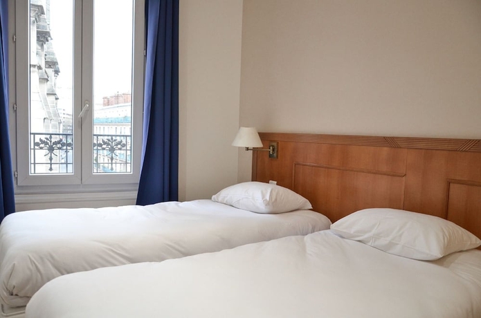 Imagen de la habitación del Hotel Hôtel De La Perdrix Rouge. Foto 10