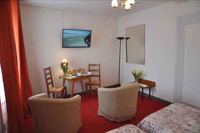 Imagen de la habitación del Hotel H&ocirc;tel De Paris, Poligny. Foto 7