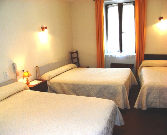 Imagen de la habitación del Hotel H&ocirc;tel De Paris, Poligny. Foto 9