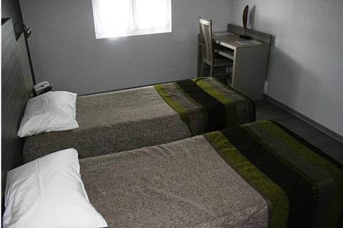 Imagen de la habitación del Hotel Hôtel Du Centre, Soustons. Foto 10