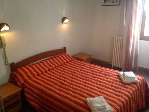 Imagen de la habitación del Hotel H&ocirc;tel Du Cheval Blanc. Foto 6