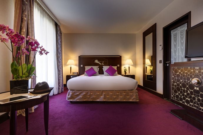 Imagen de la habitación del Hotel Hôtel Du Collectionneur. Foto 9