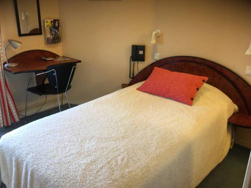 Imagen de la habitación del Hotel Hôtel Du Commerce, MONTAUBAN. Foto 10