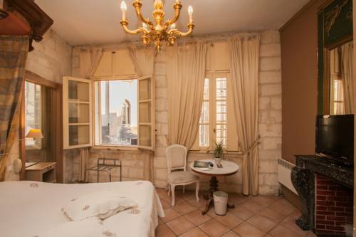 Imagen de la habitación del Hotel H&ocirc;tel Du Palais Des Papes, Avignon. Foto 4