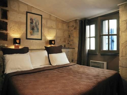 Imagen de la habitación del Hotel H&ocirc;tel Du Palais Des Papes. Foto 5