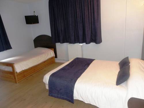 Imagen de la habitación del Hotel Hôtel Du Port. Foto 8