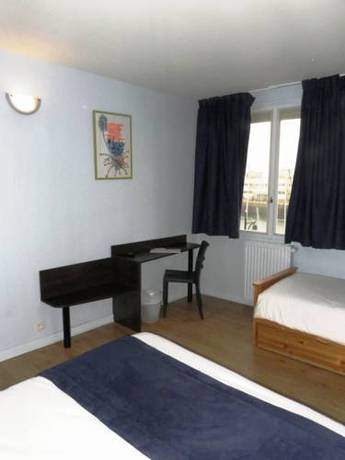 Imagen de la habitación del Hotel Hôtel Du Port. Foto 15