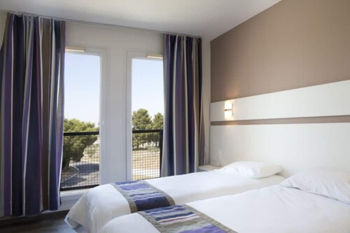 Imagen de la habitación del Hotel H&ocirc;tel Du Village Catalan. Foto 14