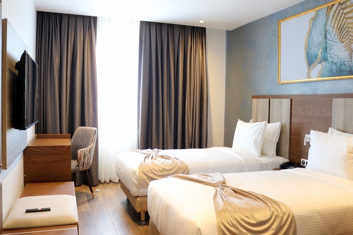 Imagen de la habitación del Hotel H&ocirc;tel EL AZIZ INN. Foto 5