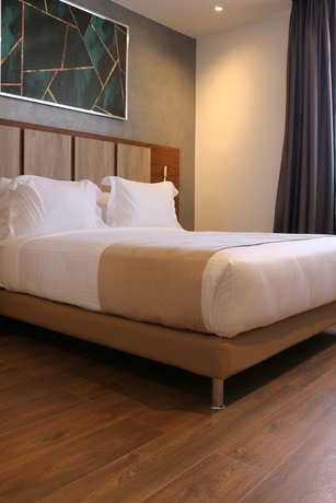 Imagen de la habitación del Hotel H&ocirc;tel EL AZIZ INN. Foto 7