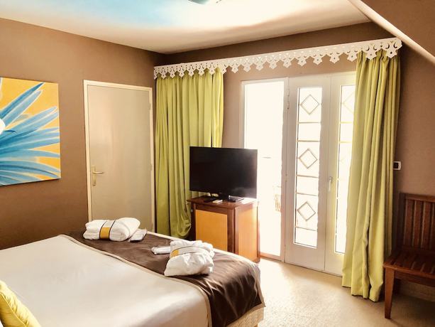 Imagen de la habitación del Hotel Hôtel Exsel Créolia. Foto 17