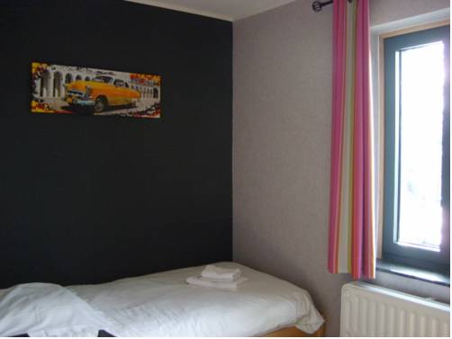 Imagen de la habitación del Hotel Hôtel Francorchamps Pitlane Lodge. Foto 7