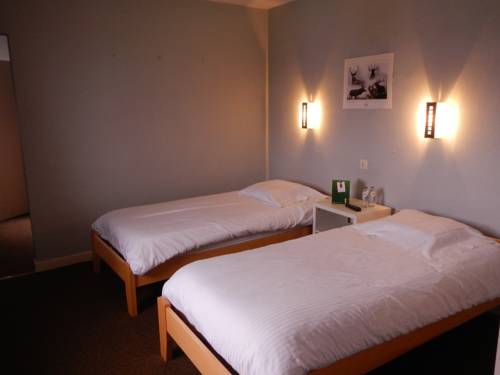 Imagen de la habitación del Hotel Hôtel Francorchamps Pitlane Lodge. Foto 11