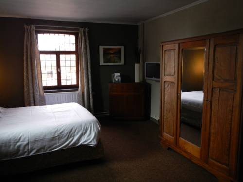 Imagen de la habitación del Hotel Hôtel Francorchamps Pitlane Lodge. Foto 13