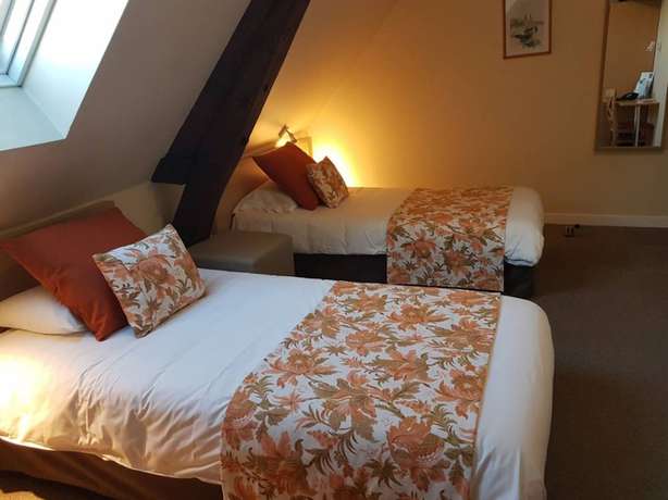 Imagen de la habitación del Hotel H&ocirc;tel Henri IV, COUTRAS. Foto 2