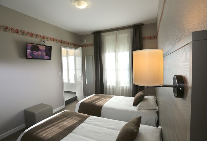 Imagen de la habitación del Hotel H&ocirc;tel Henri IV, COUTRAS. Foto 10