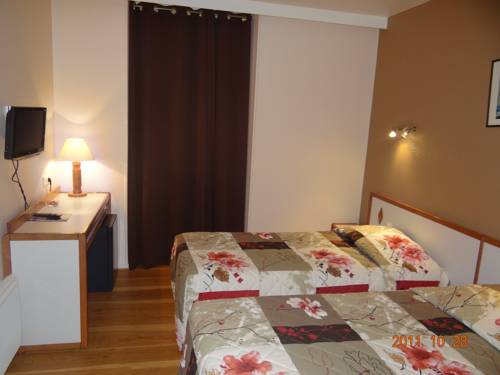 Imagen de la habitación del Hotel H&ocirc;tel Hermance. Foto 12