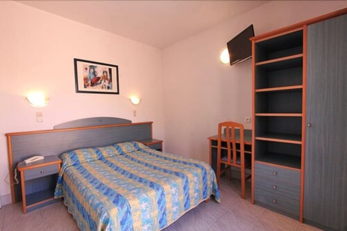 Imagen de la habitación del Hotel H&ocirc;tel Id&eacute;al, Ota. Foto 13