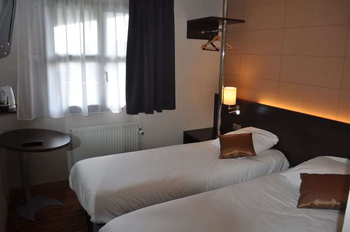 Imagen de la habitación del Hotel H&ocirc;tel Inn Design Langres Resto Novo. Foto 8