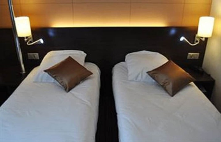 Imagen de la habitación del Hotel H&ocirc;tel Inn Design Langres Resto Novo. Foto 16