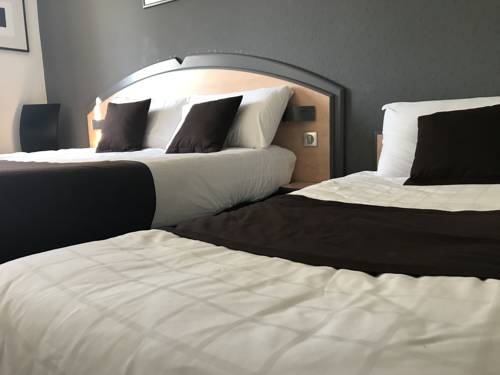 Imagen de la habitación del Hotel Hôtel Kyriad Brive Ouest. Foto 4