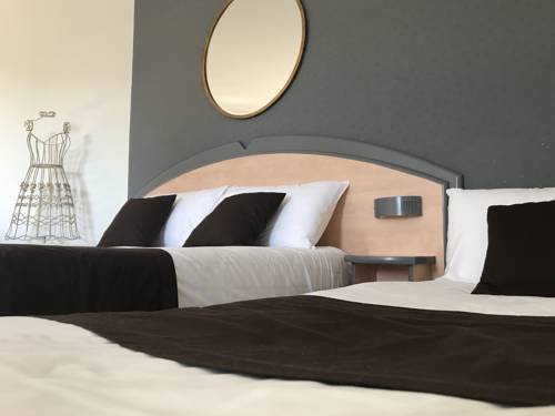 Imagen de la habitación del Hotel Hôtel Kyriad Brive Ouest. Foto 6