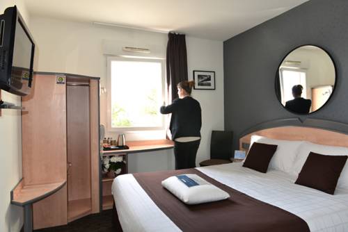Imagen de la habitación del Hotel Hôtel Kyriad Brive Ouest. Foto 8