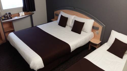 Imagen de la habitación del Hotel Hôtel Kyriad Brive Ouest. Foto 13