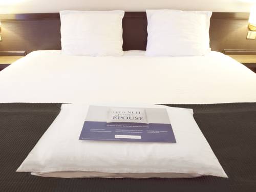 Imagen de la habitación del Hotel Hôtel Kyriad Brive Ouest. Foto 14