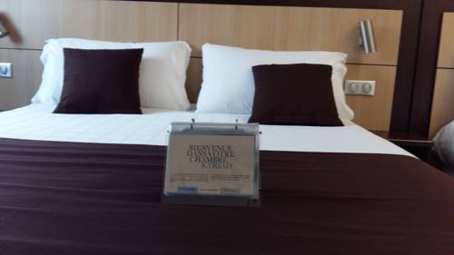 Imagen de la habitación del Hotel Hôtel Kyriad Brive Ouest. Foto 15