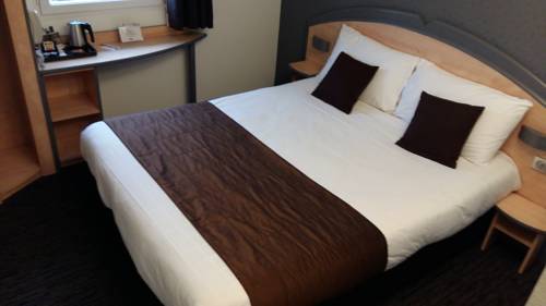 Imagen de la habitación del Hotel Hôtel Kyriad Brive Ouest. Foto 16