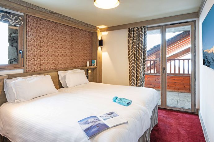 Imagen de la habitación del Hotel H&ocirc;tel L'Aigle du Montana by Les Etincelles. Foto 8