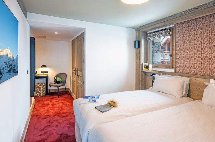 Imagen de la habitación del Hotel H&ocirc;tel L'Aigle du Montana by Les Etincelles. Foto 9