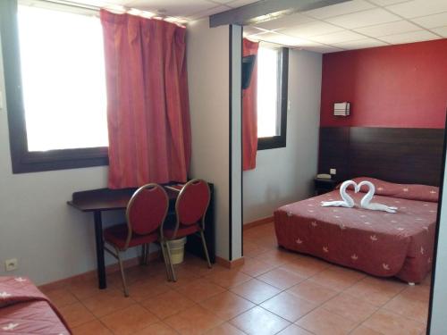 Imagen de la habitación del Hotel Hôtel L\'Hacienda. Foto 7