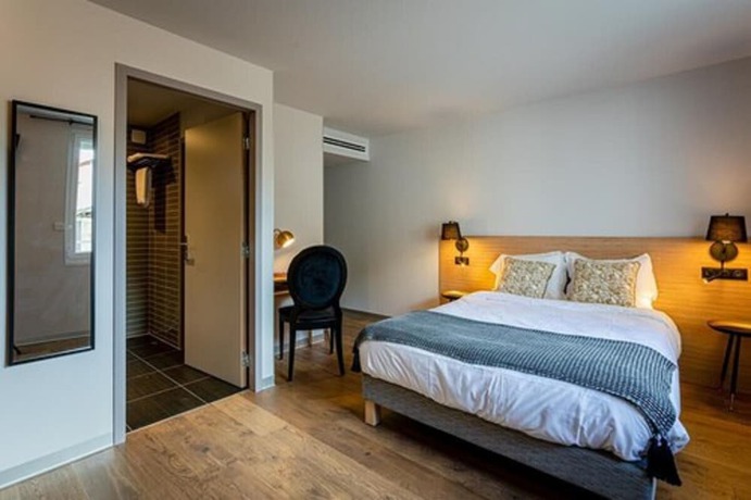 Imagen de la habitación del Hotel H&ocirc;tel L\'Ouvr&eacute;e Restaurant le 428. Foto 7