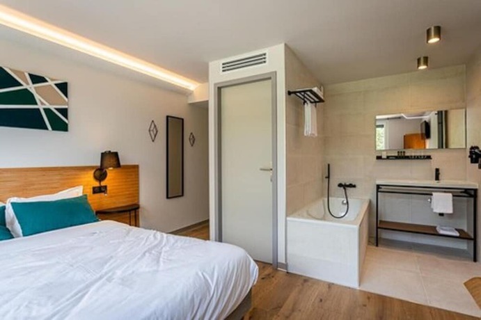 Imagen de la habitación del Hotel H&ocirc;tel L\'Ouvr&eacute;e Restaurant le 428. Foto 18