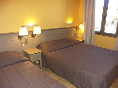 Imagen de la habitación del Hotel H&ocirc;tel La Bonne Auberge. Foto 8