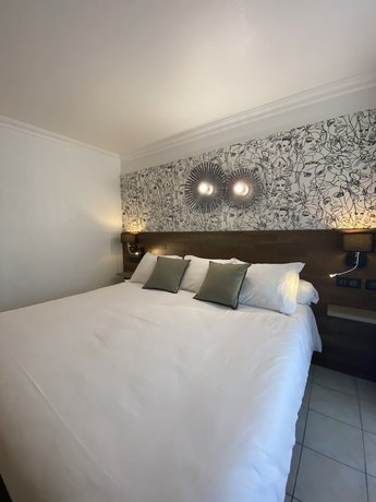 Imagen de la habitación del Hotel H&ocirc;tel La Lagune. Foto 18