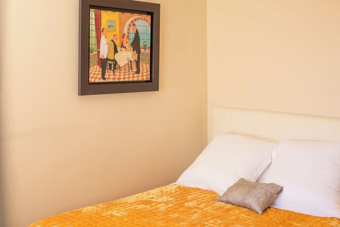 Imagen de la habitación del Hotel Hôtel La Mère Germaine. Foto 12