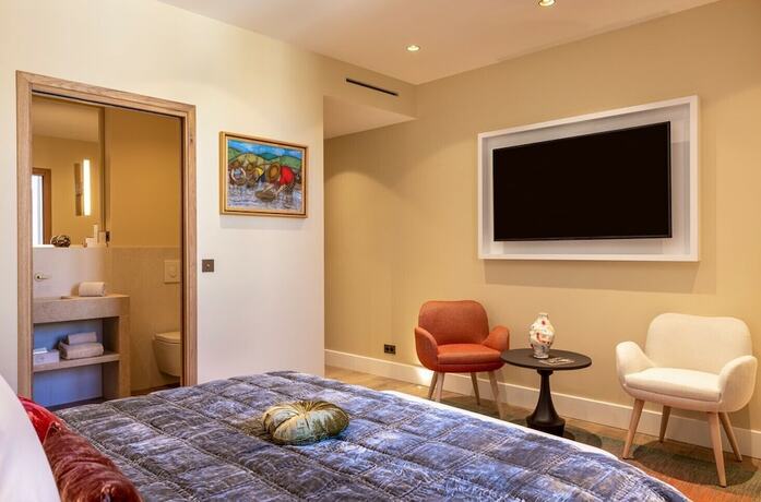 Imagen de la habitación del Hotel Hôtel La Mère Germaine. Foto 14