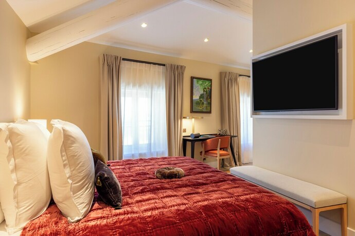 Imagen de la habitación del Hotel Hôtel La Mère Germaine. Foto 20