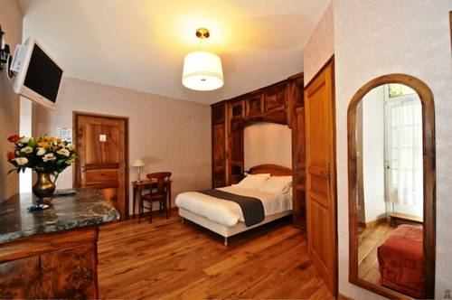 Imagen de la habitación del Hotel H&ocirc;tel La Montagne Fleurie. Foto 6