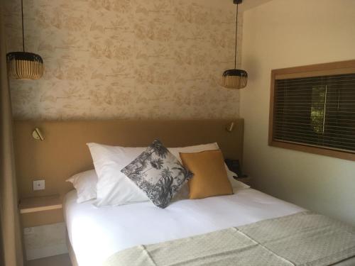 Imagen de la habitación del Hotel H&ocirc;tel La Piscine. Foto 6
