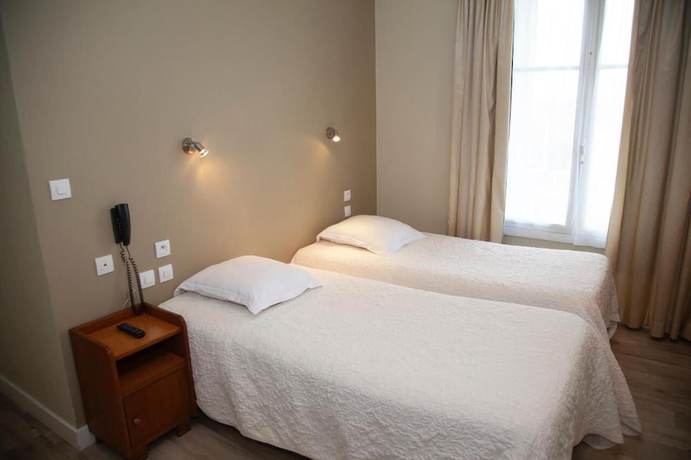 Imagen de la habitación del Hotel H&ocirc;tel La Pocatiere, COUTANCES. Foto 10