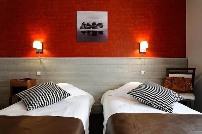 Imagen de la habitación del Hotel Hôtel La Résidence des Artistes. Foto 7