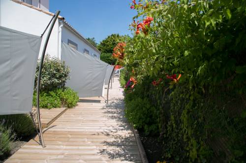 Imagen de la habitación del Hotel H&ocirc;tel La Villa En L'&icirc;le. Foto 14