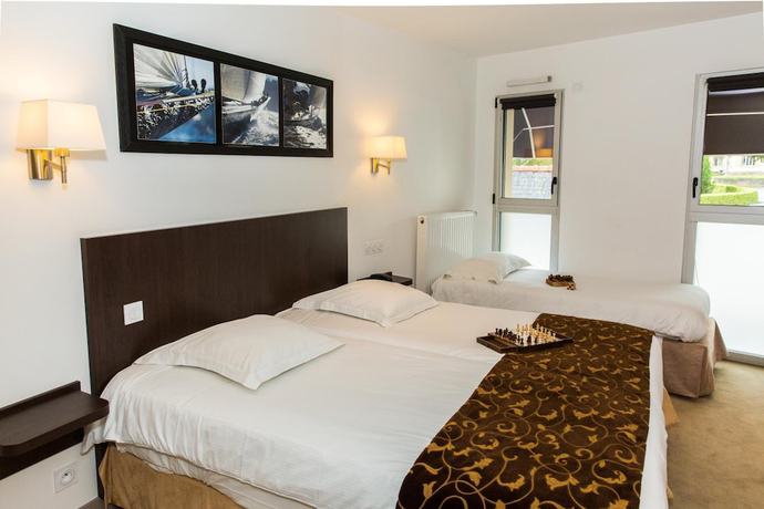 Imagen de la habitación del Hotel H&ocirc;tel Le Bellevue, L'Enclos. Foto 3