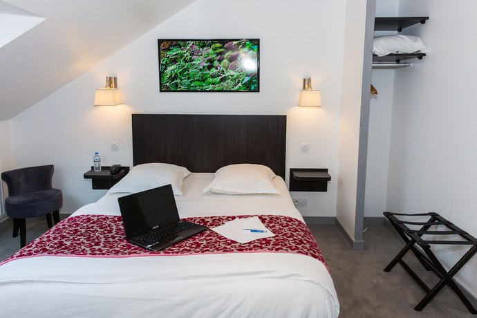 Imagen de la habitación del Hotel H&ocirc;tel Le Bellevue, L'Enclos. Foto 8