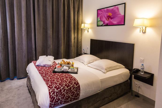 Imagen de la habitación del Hotel H&ocirc;tel Le Bellevue, L'Enclos. Foto 11